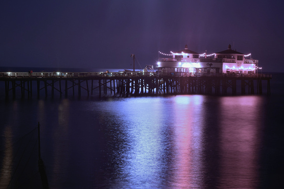 Reflections On A Pier